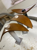 Handcrafted mid-century modern wood accent lamps in workshop