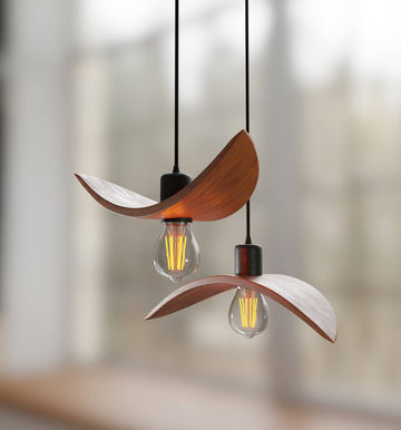 Modern sculptural pendant lights in natural wood resembling birds in flight