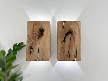 Modern rustic oak wood wall lights casting up and down light