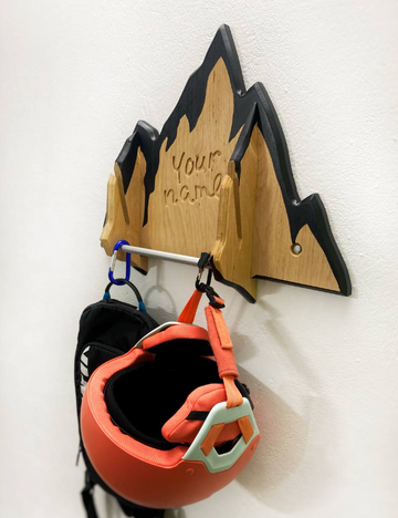 Personalized mountain design wood rack for snowboards and gear