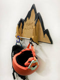 Personalized mountain design wood rack for snowboards and gear