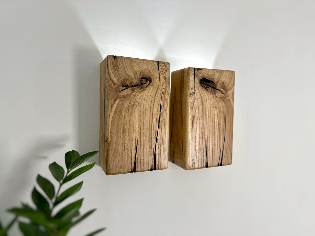 Modern rustic oak wood wall lights casting up and down light