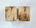 Modern rustic oak wood wall lights casting up and down light