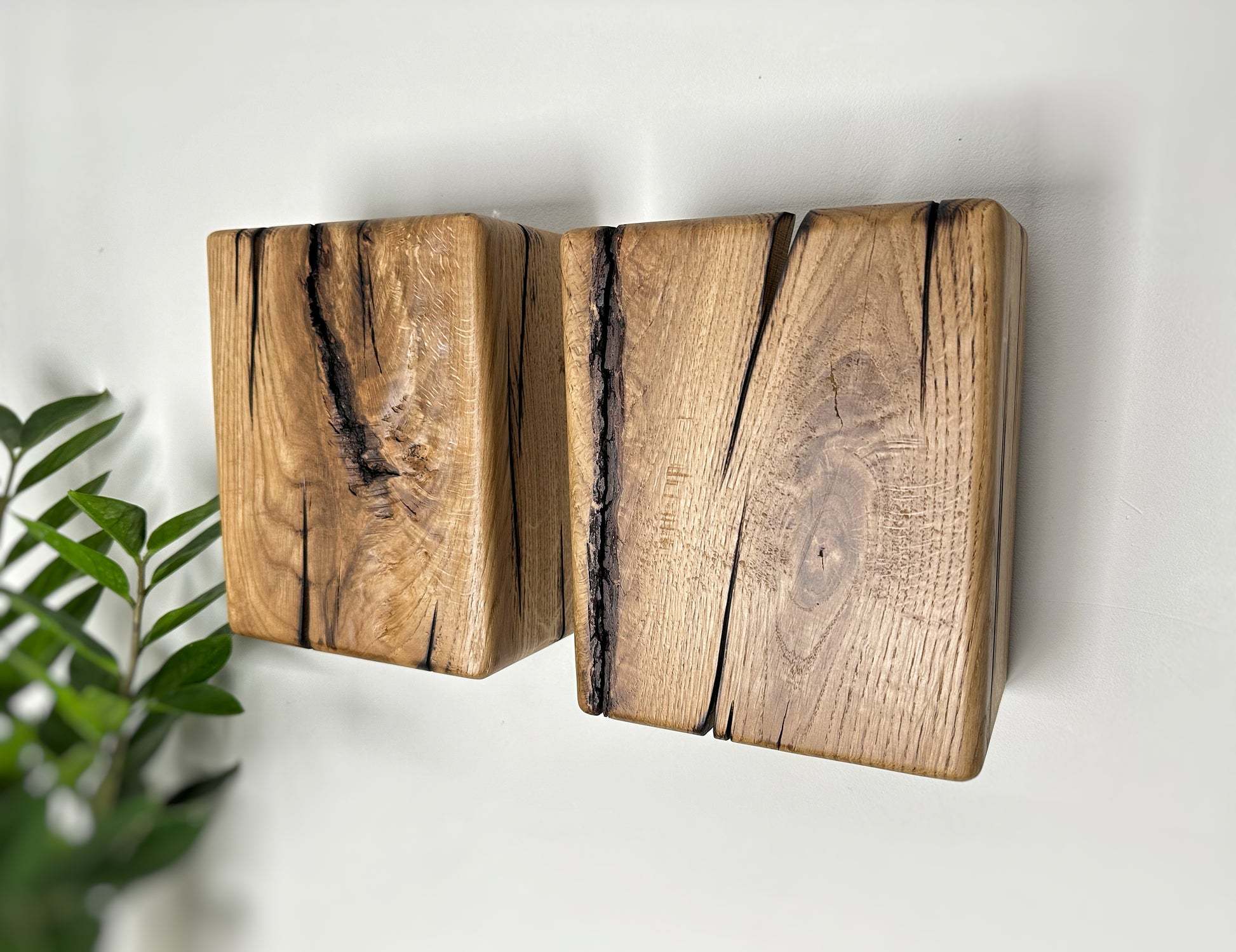 Modern rustic oak wood wall lights casting up and down light