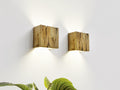 Modern rustic oak wood wall lights casting up and down light