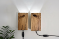 handmade wood sconces with black cordes with switches